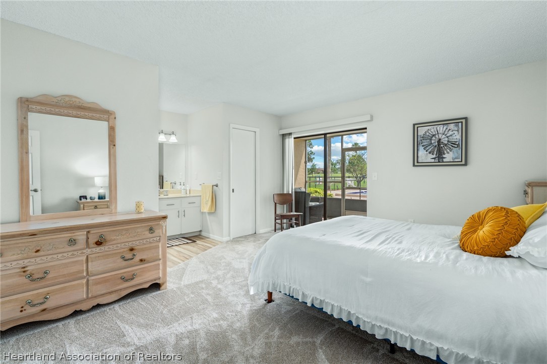 3607 Edgewater Drive Sebring, FL 33872 - Photo 9 of 22 a bedroom with a bed and a window