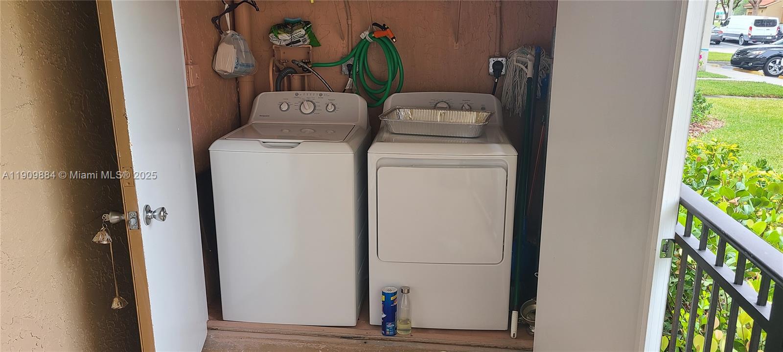 220 Southwest 116th Avenue, Unit 15103 Pembroke Pines, FL 33025 - Photo 14 of 51 a utility room with dryer and washer