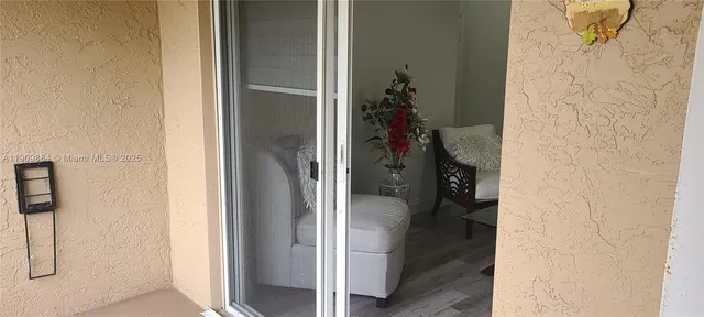 a bedroom with furniture and a garden