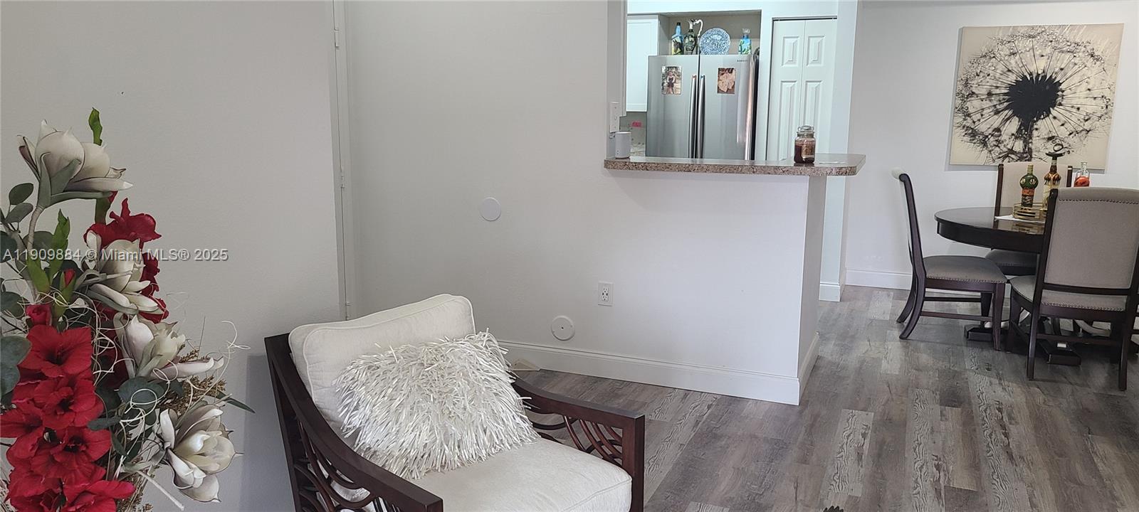 220 Southwest 116th Avenue, Unit 15103 Pembroke Pines, FL 33025 - Photo 20 of 51 a view of a room with furniture and wooden floor