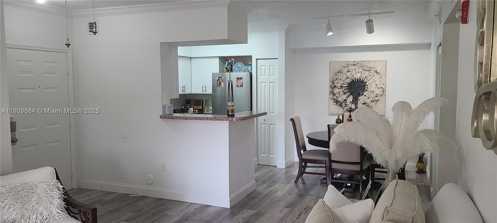 220 Southwest 116th Avenue, Unit 15103 Pembroke Pines, FL 33025 - Photo 21 of 51 a view of a room with gym equipment