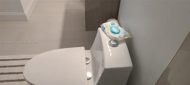 a view of a room with a sink and cabinet