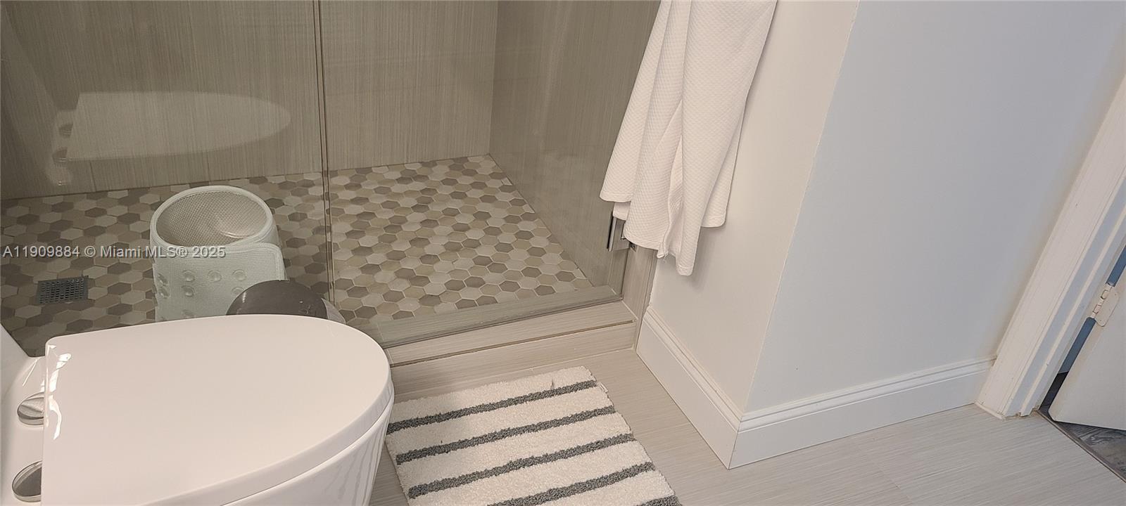 220 Southwest 116th Avenue, Unit 15103 Pembroke Pines, FL 33025 - Photo 27 of 51 a bathroom with a sink and a shower