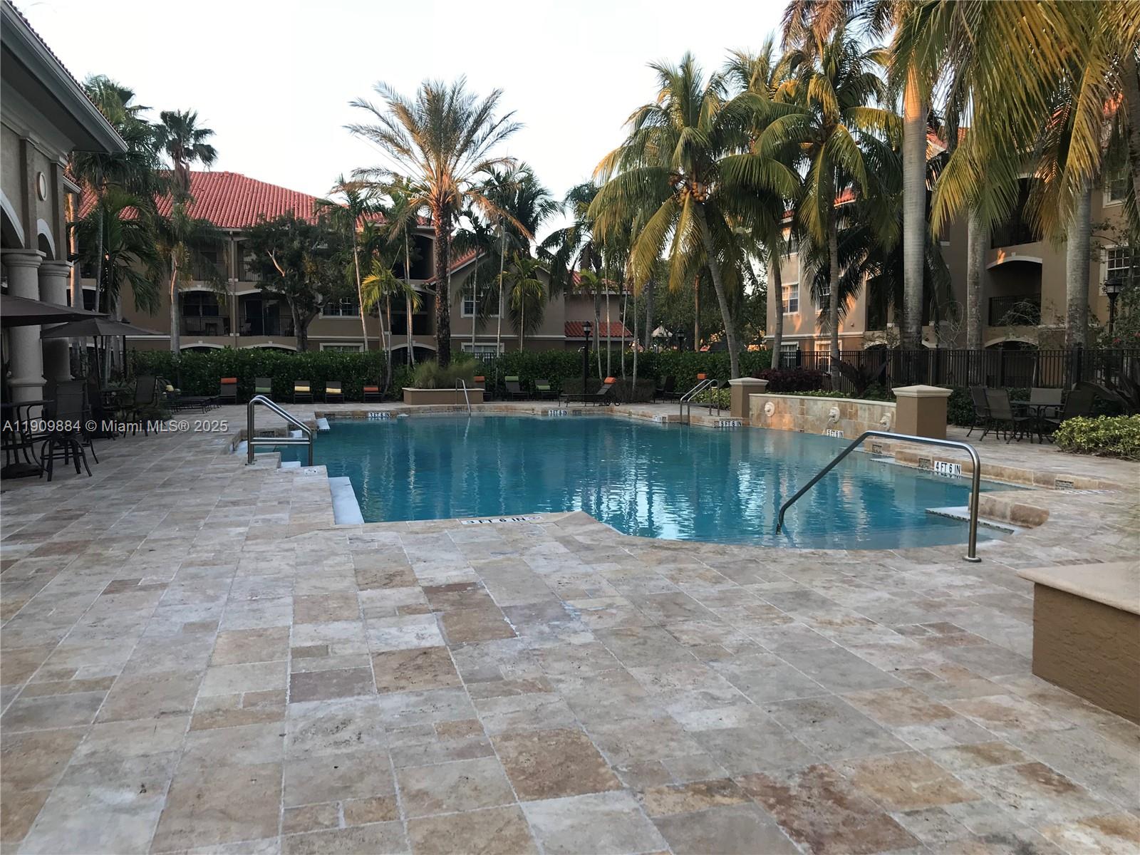 220 Southwest 116th Avenue, Unit 15103 Pembroke Pines, FL 33025 - Photo 46 of 51 a view of a backyard