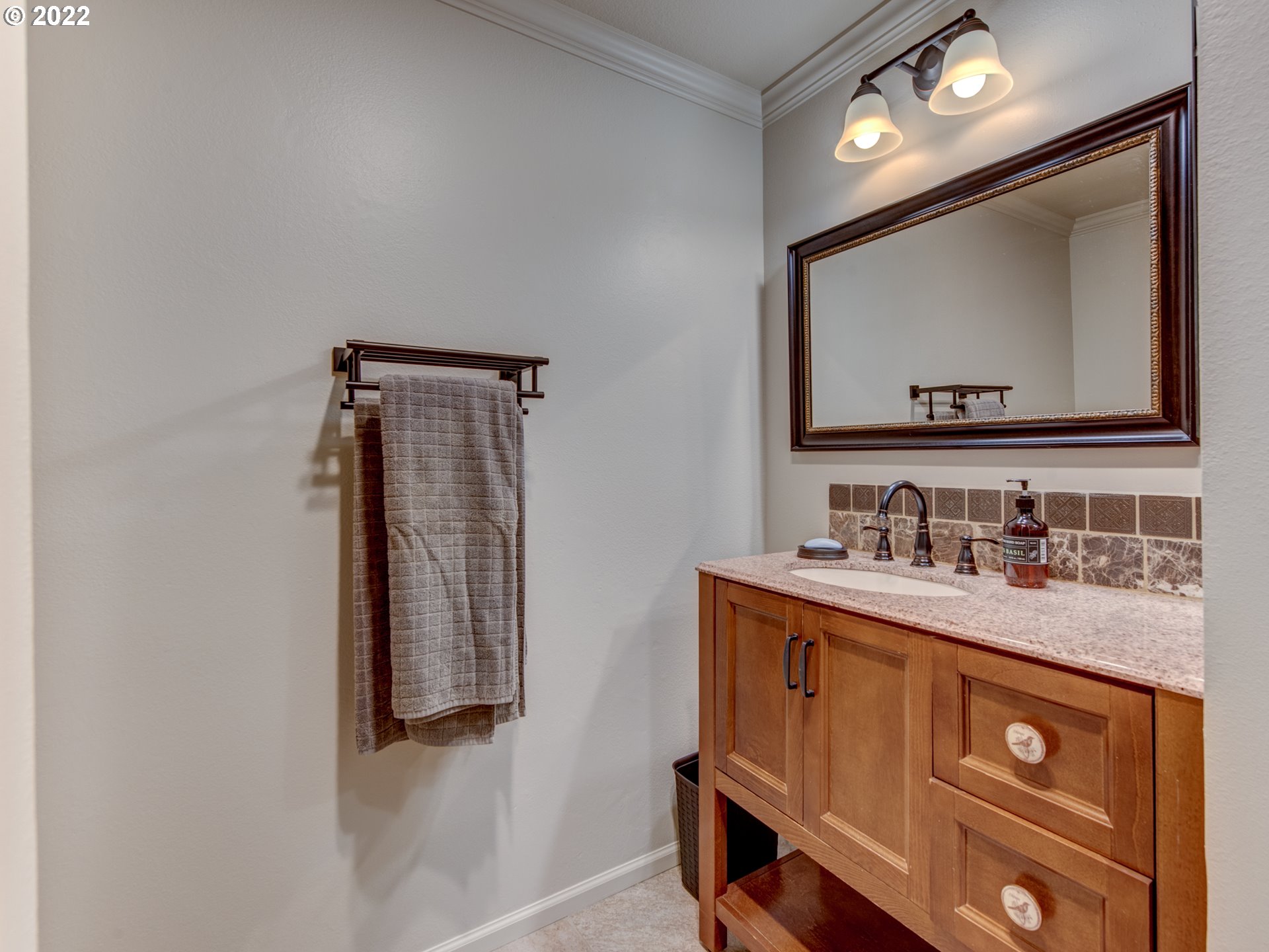 43 Westbrook Way Eugene, OR 97405 - Photo 19 of 32 a bathroom with a sink vanity and mirror