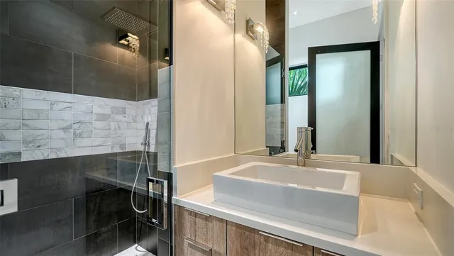 a bathroom with a sink and a mirror