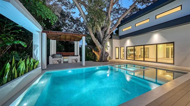 a view of a swimming pool with a patio
