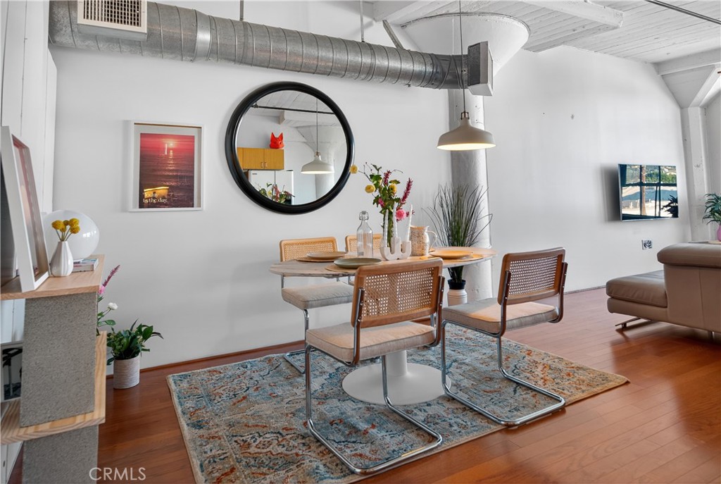 200 North San Fernando Road, Unit 315 Los Angeles, CA 90031 - Photo 11 of 42 a living room with furniture a mirror and a potted plant