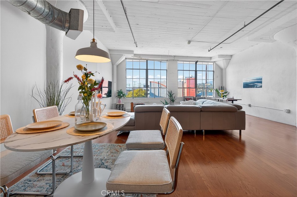 200 North San Fernando Road, Unit 315 Los Angeles, CA 90031 - Photo 15 of 42 a living room with furniture a chandelier and a table