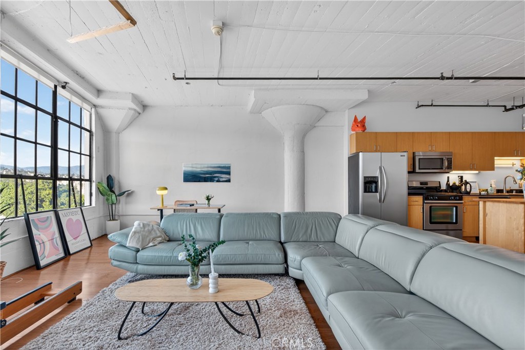 200 North San Fernando Road, Unit 315 Los Angeles, CA 90031 - Photo 16 of 42 a living room with furniture kitchen view and a window