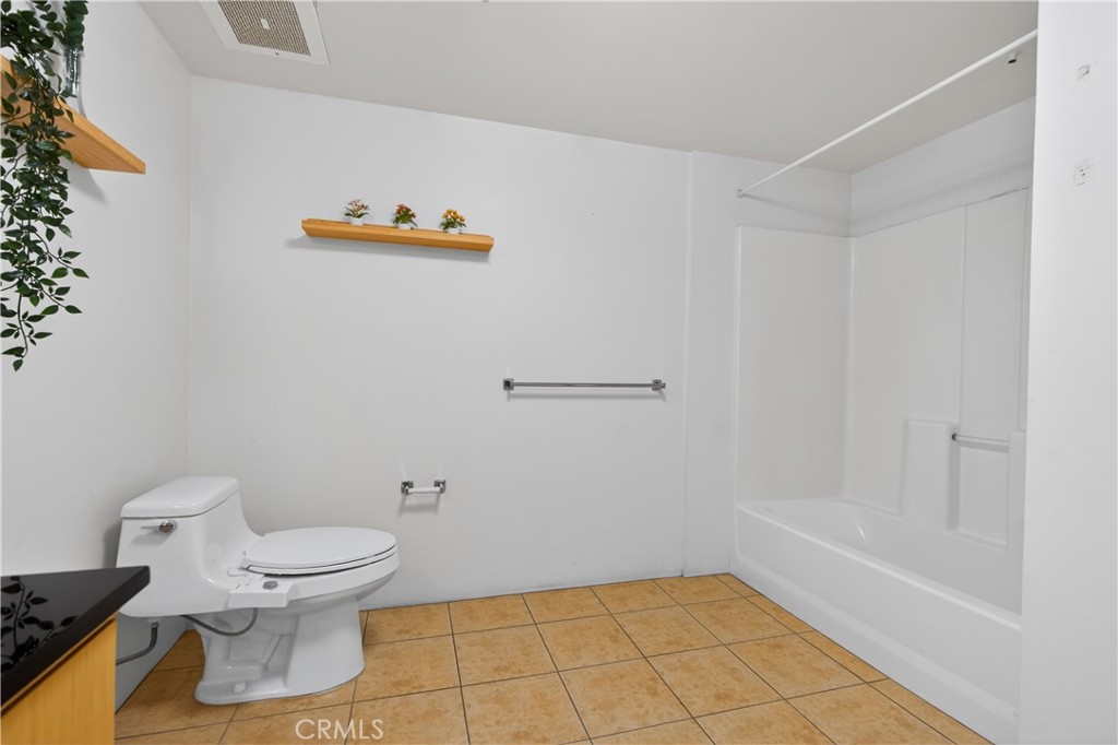200 North San Fernando Road, Unit 315 Los Angeles, CA 90031 - Photo 24 of 42 a bathroom with a toilet and a shower