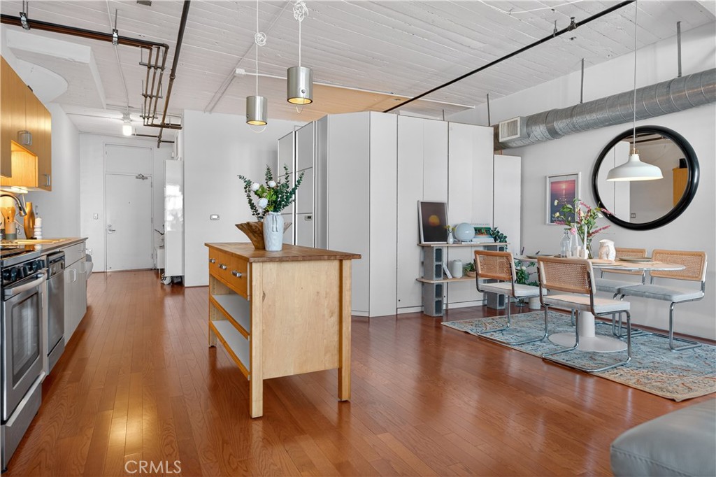 200 North San Fernando Road, Unit 315 Los Angeles, CA 90031 - Photo 5 of 42 a living room with furniture and a wooden floor