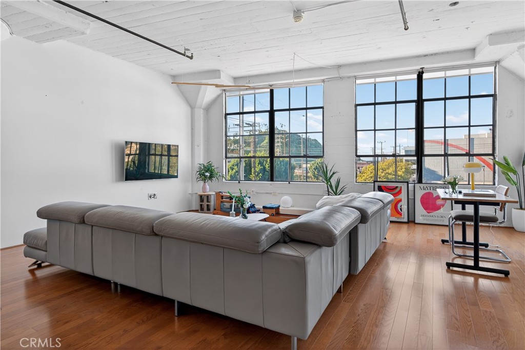 200 North San Fernando Road, Unit 315 Los Angeles, CA 90031 - Photo 7 of 42 a living room with furniture and a window