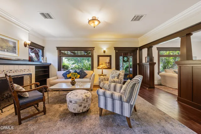 a kitchen with stainless steel appliances kitchen island granite countertop a refrigerator and cabinets