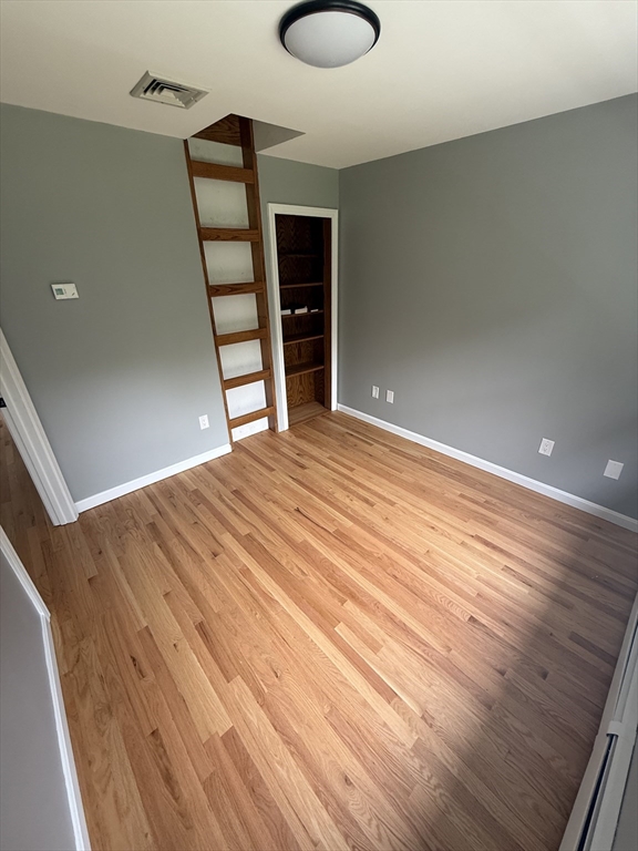 295 Frenchtown Road East Greenwich, RI 02818 - Photo 12 of 26 a view of a room with wooden floor and window
