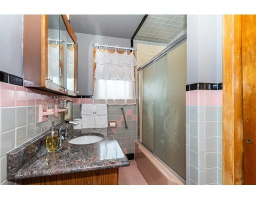 36 Howard Road Medford, MA 02155 - Photo 18 of 39 a bathroom with a sink and a mirror