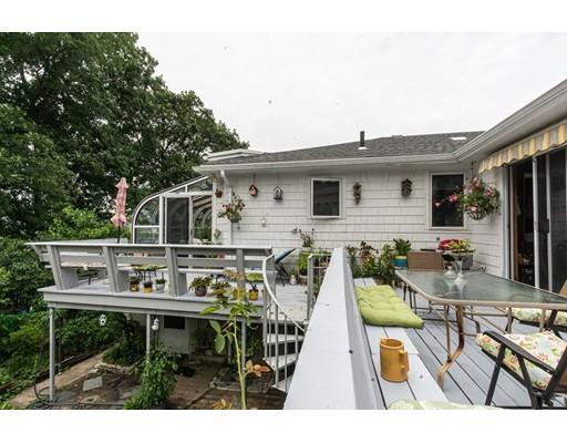 36 Howard Road Medford, MA 02155 - Photo 25 of 39 a view of a house with pool and chairs