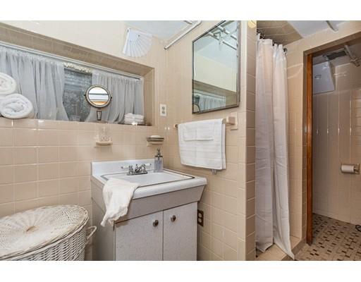 36 Howard Road Medford, MA 02155 - Photo 31 of 39 a bathroom with a sink toilet and shower