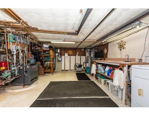 36 Howard Road Medford, MA 02155 - Photo 34 of 39 a view of a garage with storage