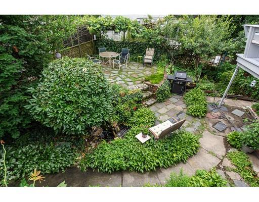 36 Howard Road Medford, MA 02155 - Photo 38 of 39 a view of a chair and table in the garden