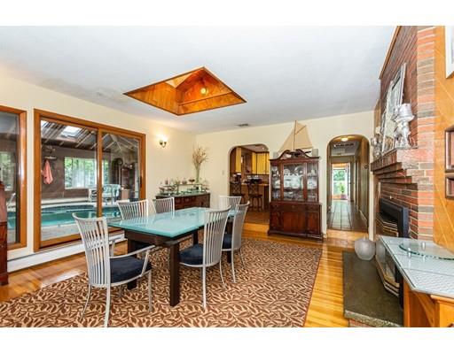 36 Howard Road Medford, MA 02155 - Photo 4 of 39 a dining hall with furniture a window and kitchen view