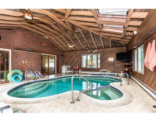 36 Howard Road Medford, MA 02155 - Photo 8 of 39 a view of a swimming pool with a patio