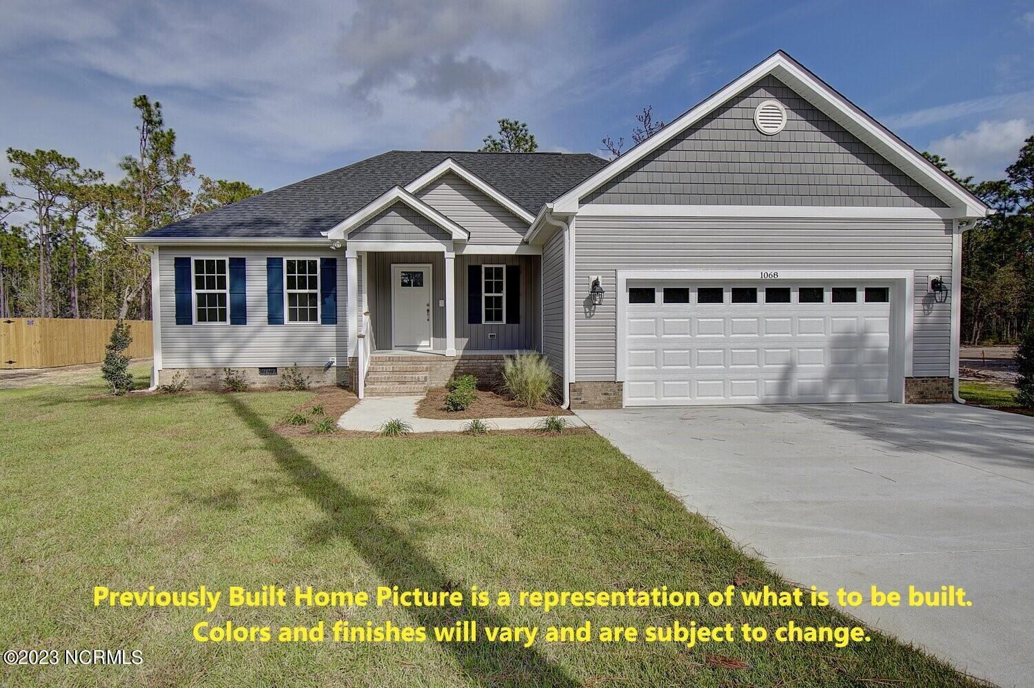 1075 Filmore Road Southport, NC 28461 - Photo 1 of 35 Previously Built Home Picture is a representation of what is to be built. Colors and finishes will vary and are subject to change.