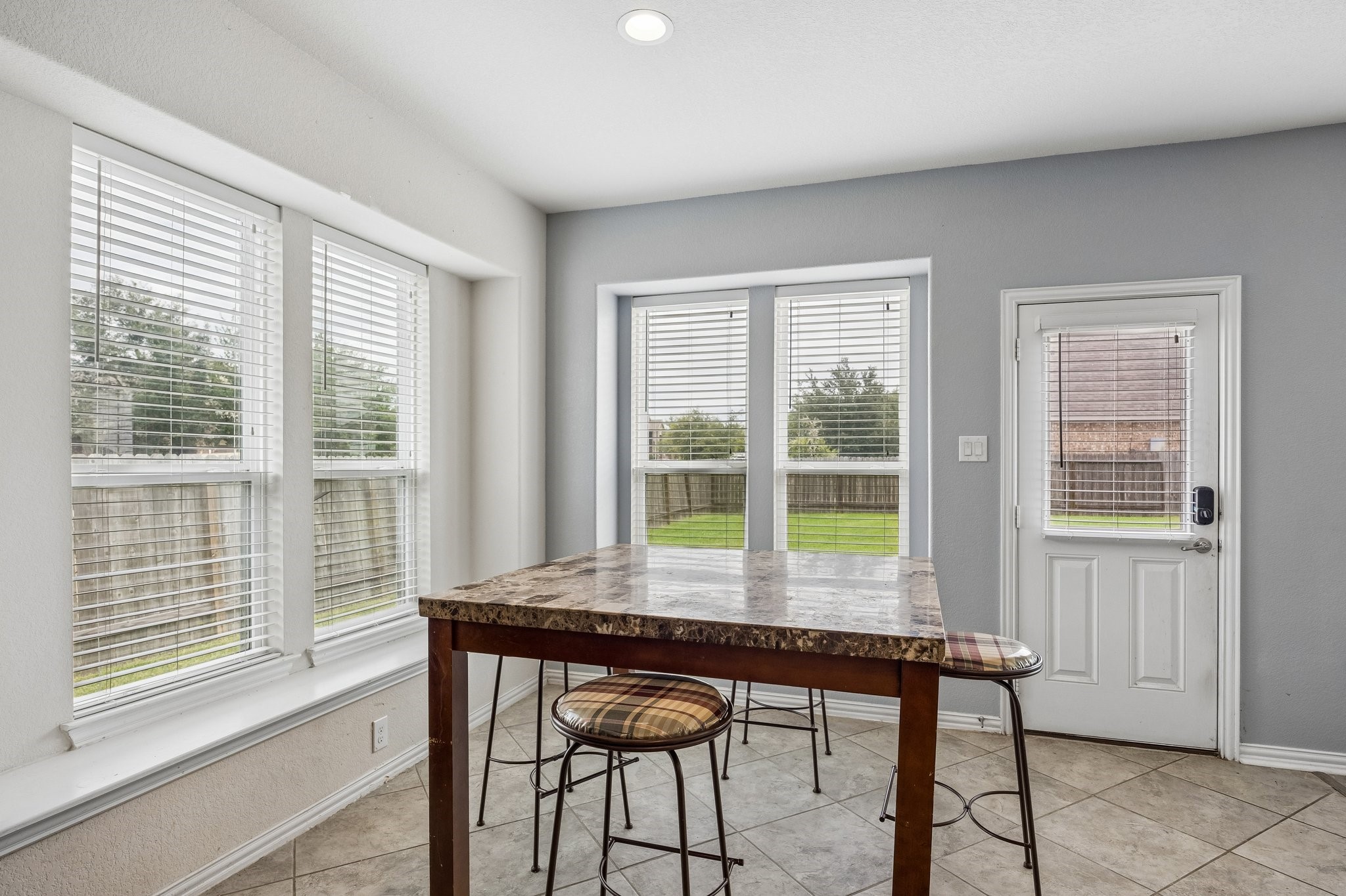 9707 Shimmering Lakes Drive Rosharon, TX 77583 - Photo 5 of 15 a view of a workspace with furniture and a window