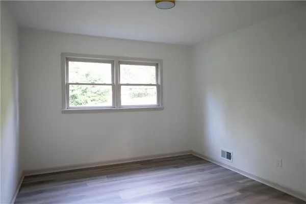 an empty room with a window