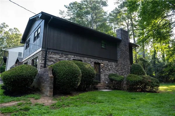 a view of a back yard of the house