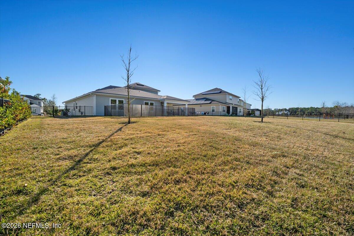 219 Morning Mist Lane St. Johns, FL 32259 - Photo 46 of 81 a big house with a big yard and large trees