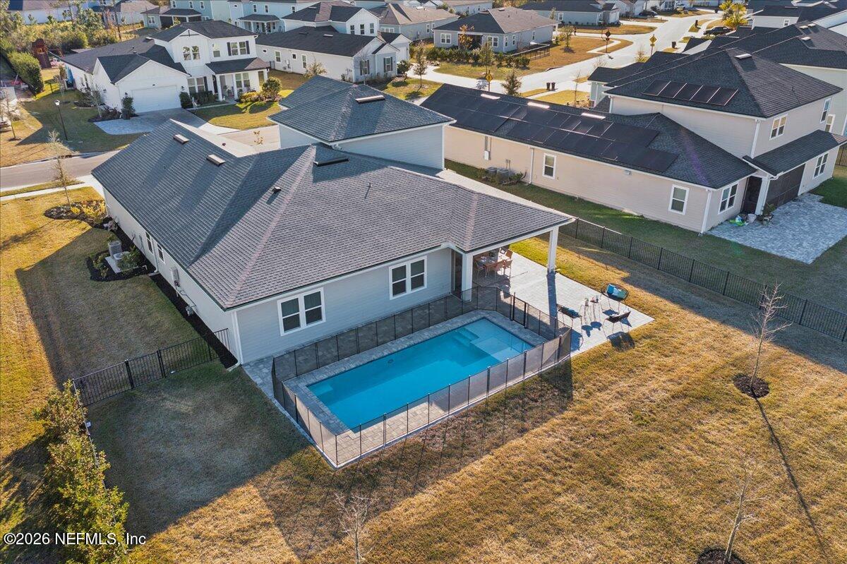 219 Morning Mist Lane St. Johns, FL 32259 - Photo 49 of 81 an aerial view of a house with swimming pool