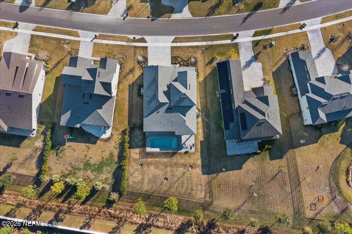 219 Morning Mist Lane St. Johns, FL 32259 - Photo 50 of 81 a view of walk in closet with clothes and shoes
