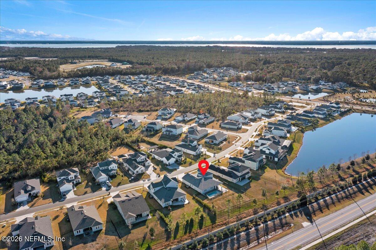 219 Morning Mist Lane St. Johns, FL 32259 - Photo 51 of 81 an aerial view of residential building and ocean