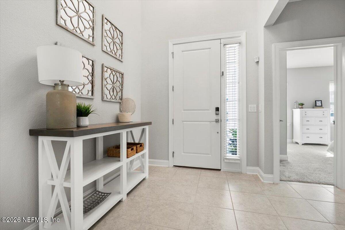 219 Morning Mist Lane St. Johns, FL 32259 - Photo 6 of 81 a view of an entryway with seating area