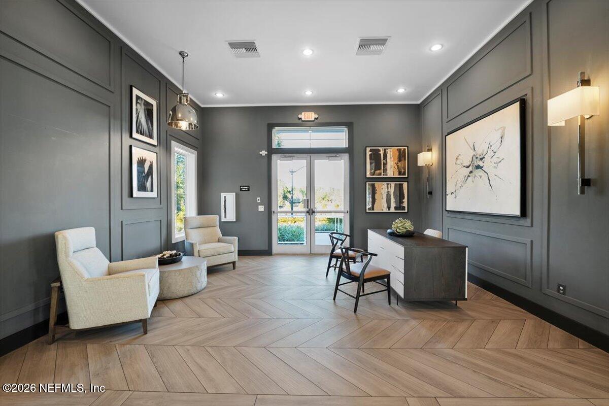 219 Morning Mist Lane St. Johns, FL 32259 - Photo 65 of 81 a living room with furniture and large window