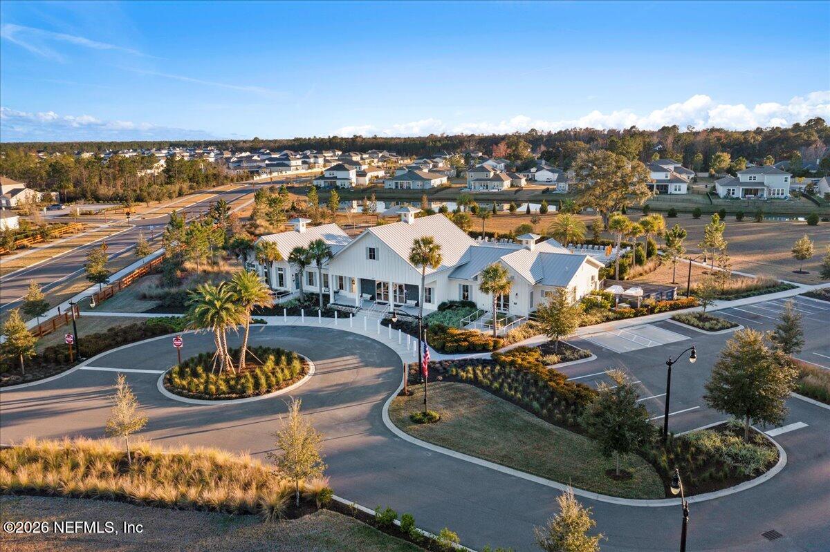 219 Morning Mist Lane St. Johns, FL 32259 - Photo 72 of 81 a view of a swimming pool with a patio and a yard