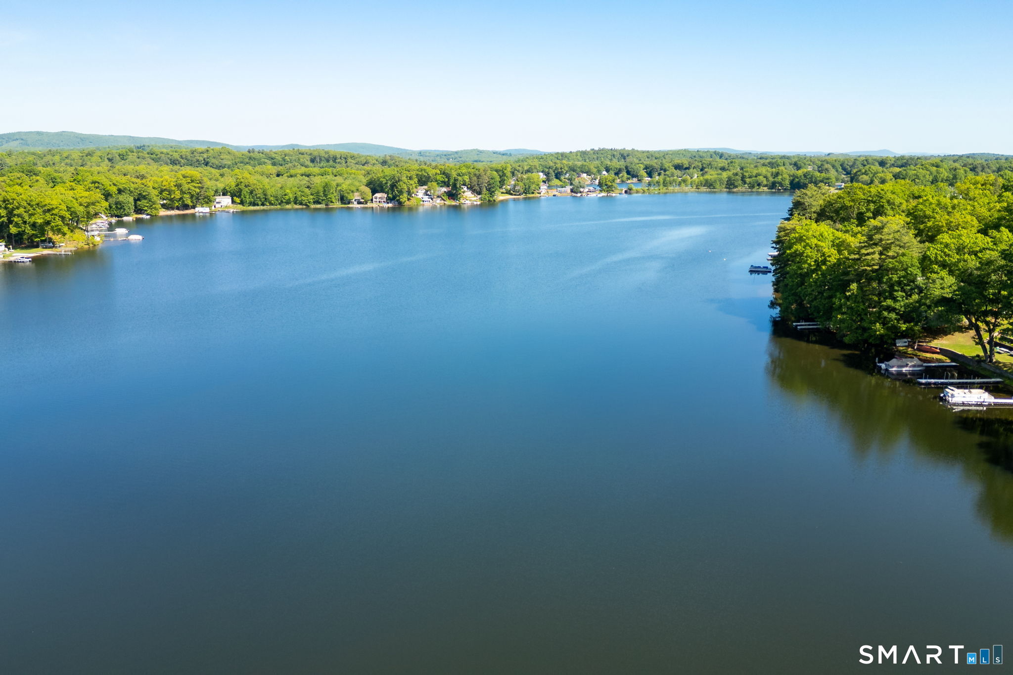 347 Griffin Road Suffield, CT 06093 - Photo 3 of 35 a view of a lake with a mountain view