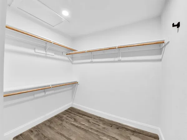 a view of an empty walk in closet