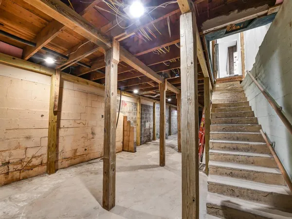 a view of under construction room and staircase