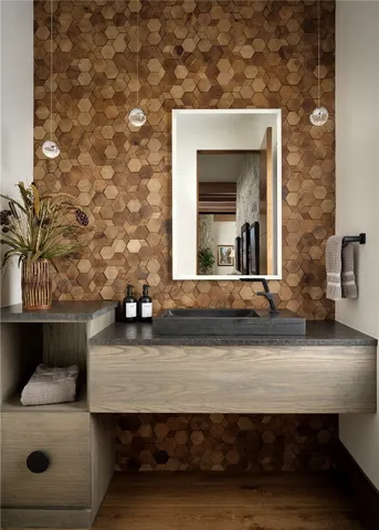 a bathroom with a sink and a mirror