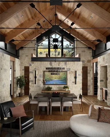 a living room with furniture and a clock