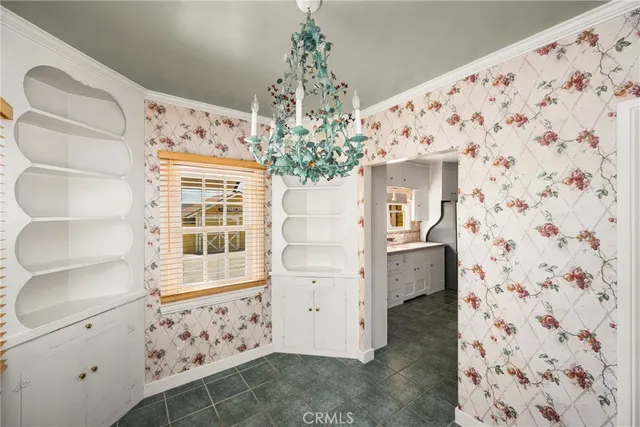 a view of a hallway with white walls