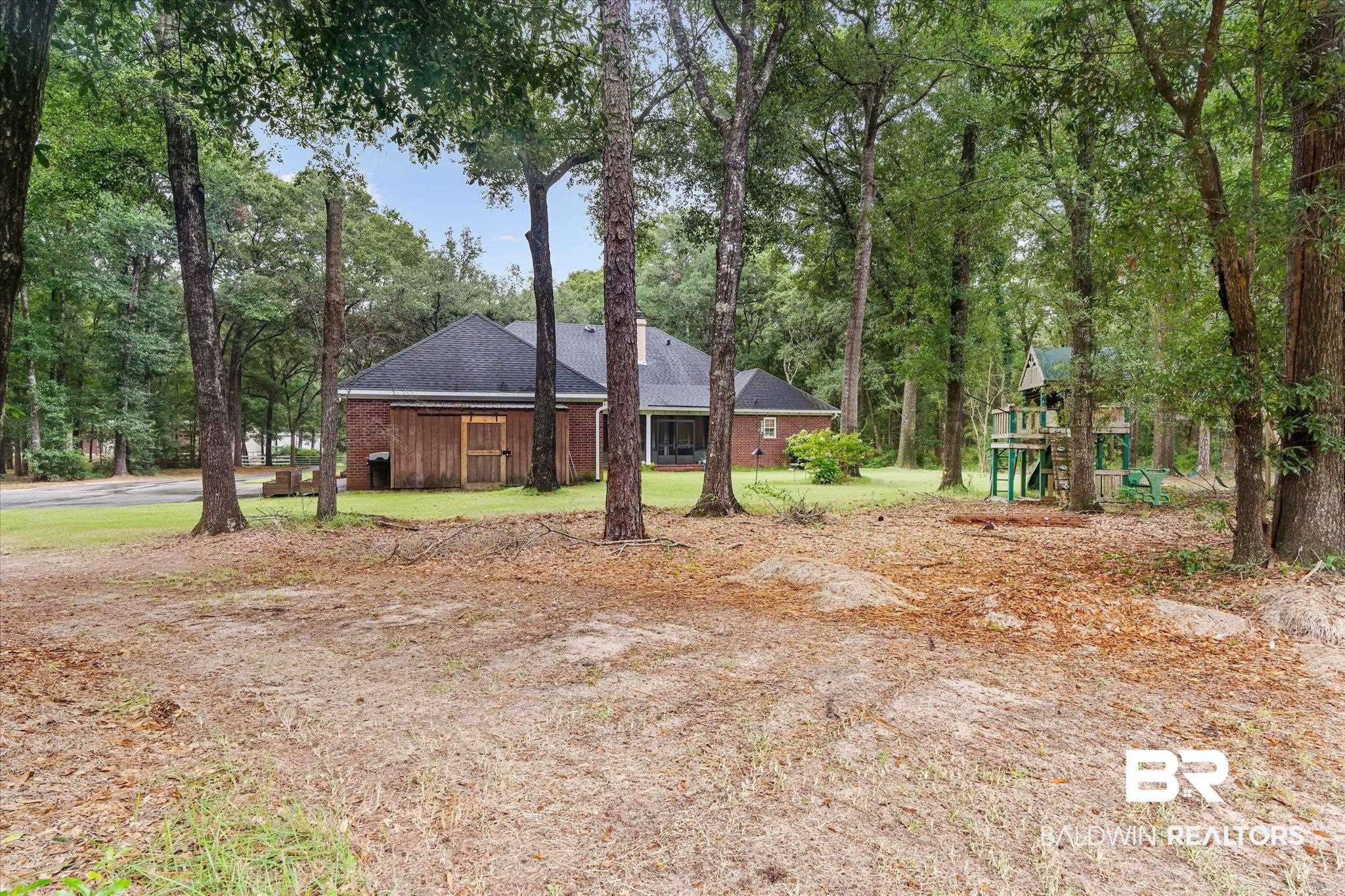 3600 Russells Lane Mobile, AL 36619 - Photo 27 of 43 View of yard with a playground