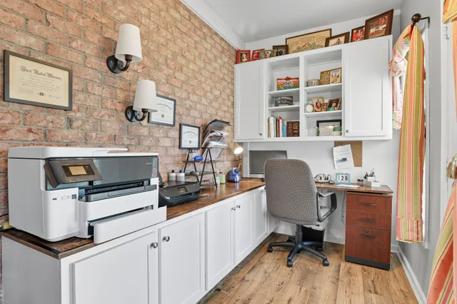 a bedroom with furniture and a bed