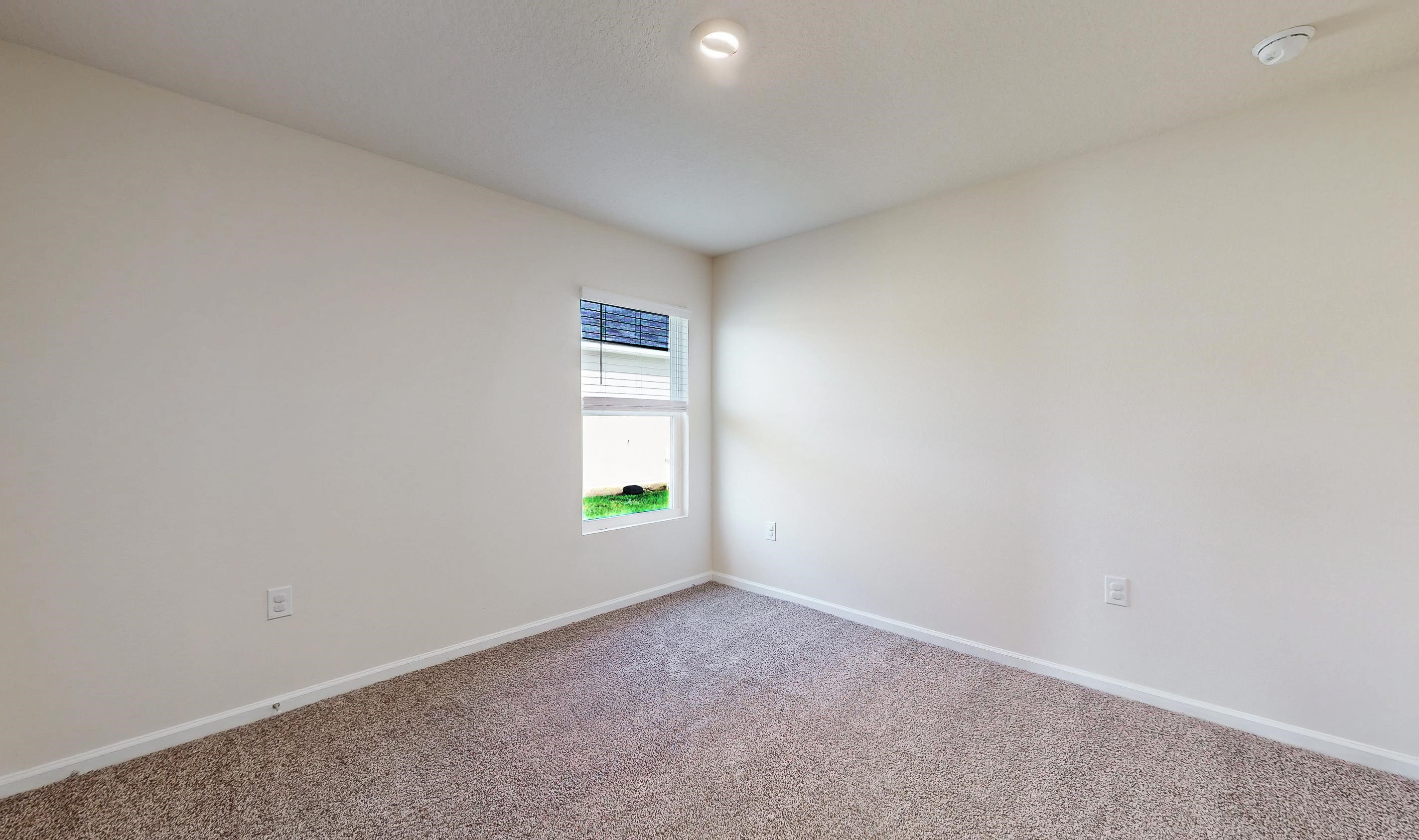 233 Falcon Ridge Road St. Augustine, FL 32084 - Photo 24 of 41 a view of an empty room and window