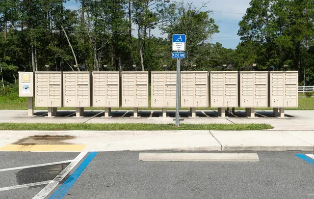 a view of sign board with a yard