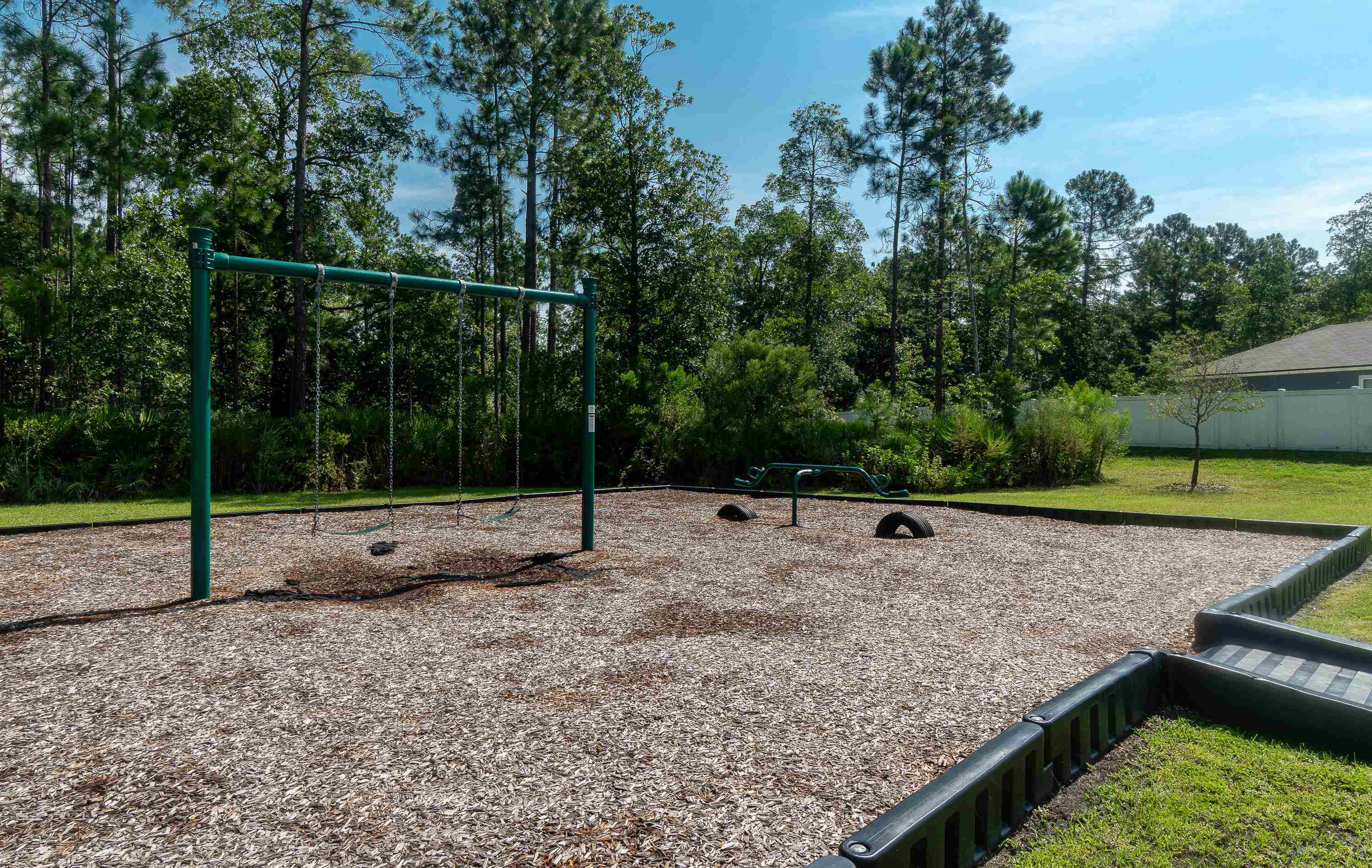 233 Falcon Ridge Road St. Augustine, FL 32084 - Photo 38 of 41 a view of a backyard with large trees