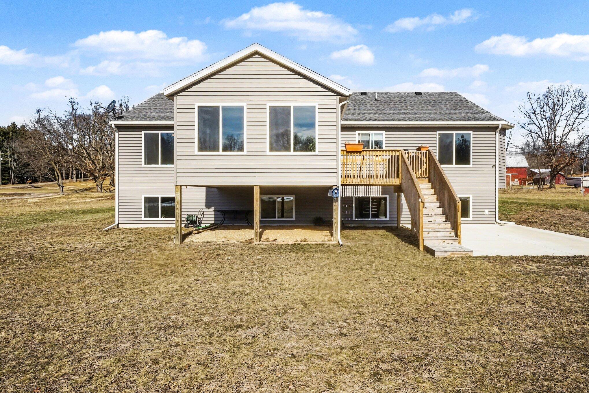 7450 19 Mile Road Northeast Cedar Springs, MI 49319 - Photo 32 of 34 Back View of Home