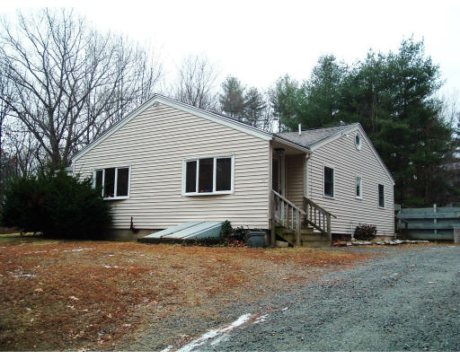 59 Middle Road Amesbury, MA 01913 - Photo 1 of 11 a view of a house with a yard